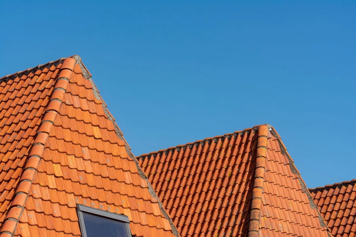 Clay barrel tile rooflines on homes in Kent, WA